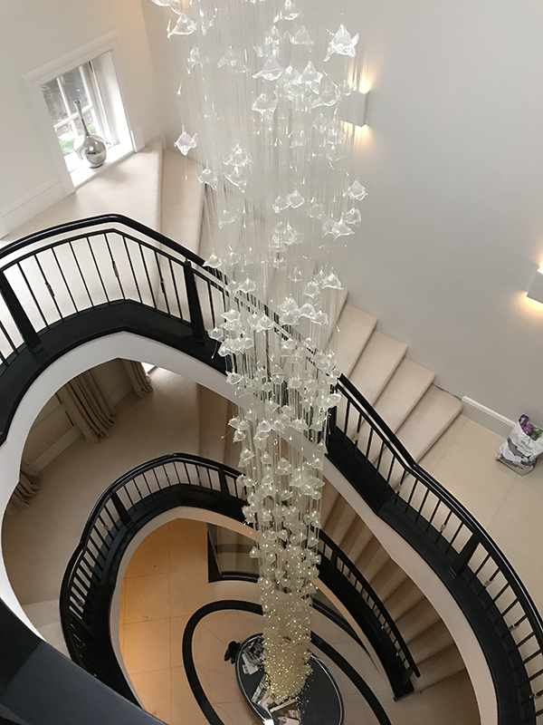 Chandelier cleaning services | full stairwell chandelier clean after shot